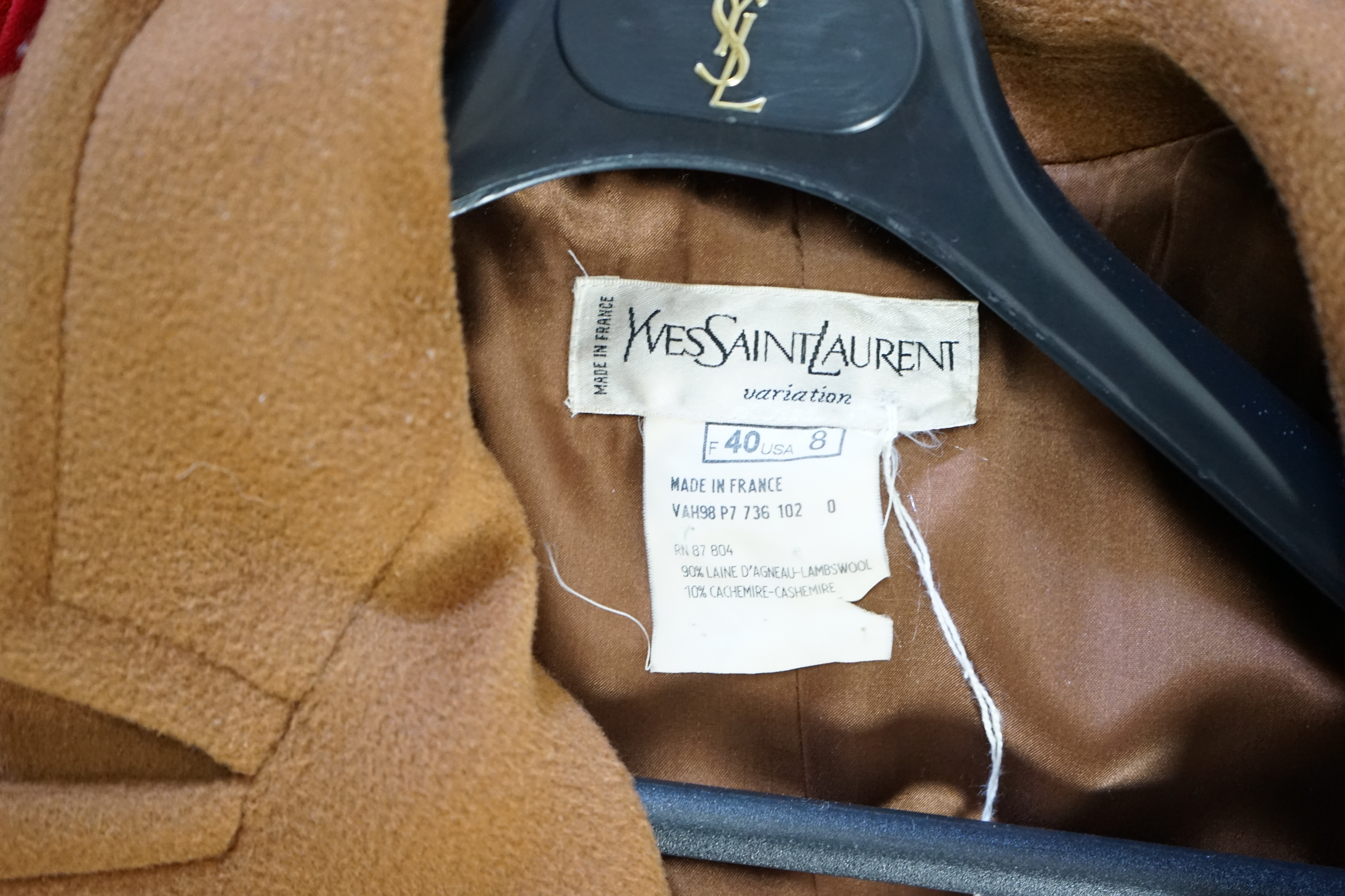 A vintage Yves Saint Laurent variation lady's dark tan double breasted wool long coat, F 40 (UK 12). Proceeds to Happy Paws Puppy Rescue